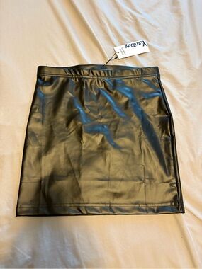 Black leather mini skirt